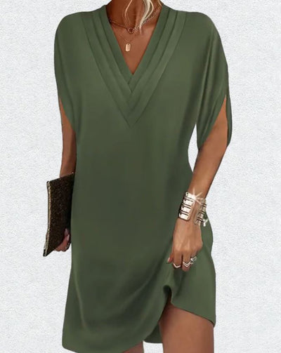 Robe élégante unie avec des manches à ouvertures