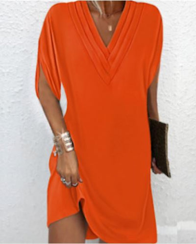 Robe élégante unie avec des manches à ouvertures