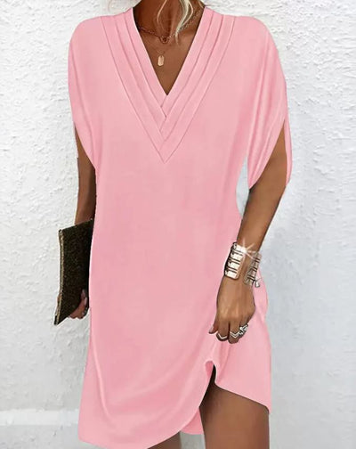 Robe élégante unie avec des manches à ouvertures
