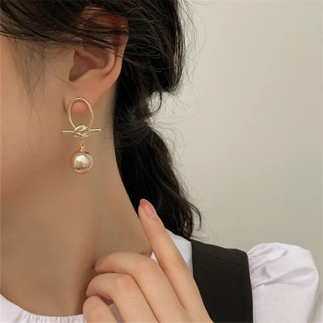 Boucles d'oreilles en perles dorées