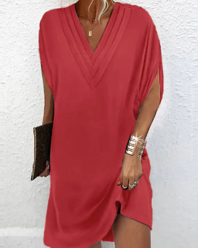 Robe élégante unie avec des manches à ouvertures