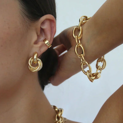 Boucles d'oreilles en forme de déclaration entrelacées | Or