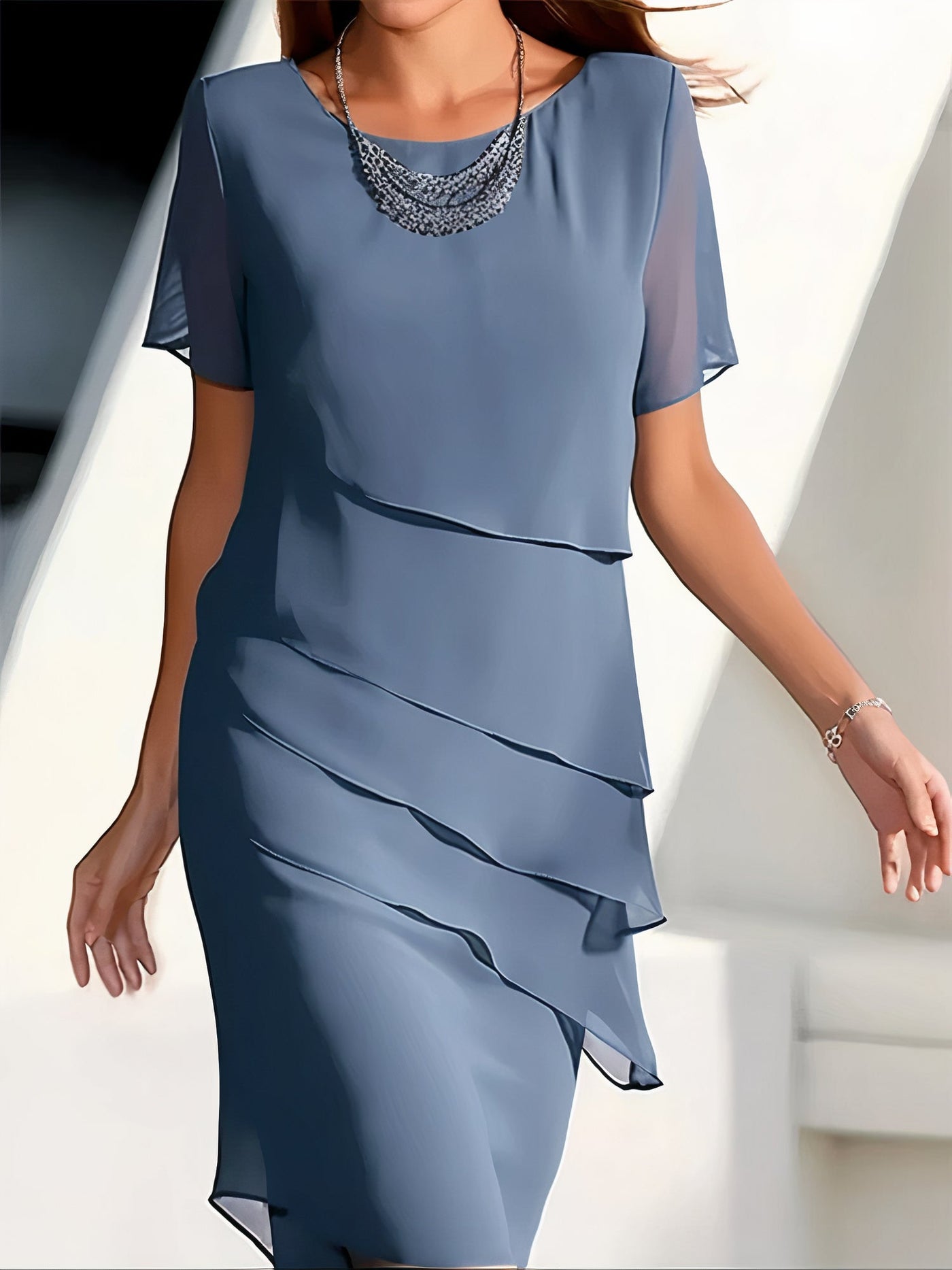 Robe plissée en chiffon de soie