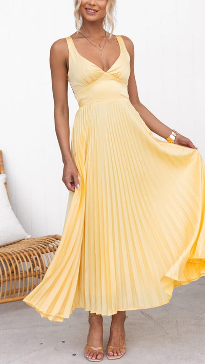 Eline | Élégante robe longue avec décolleté en V et jupe plissée